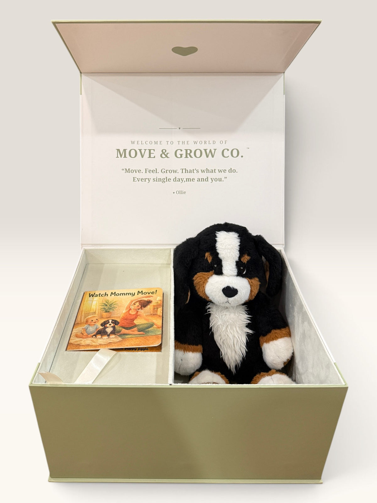 The Ollie Set opened with Ollie and three board books inside the magnetic keepsake box